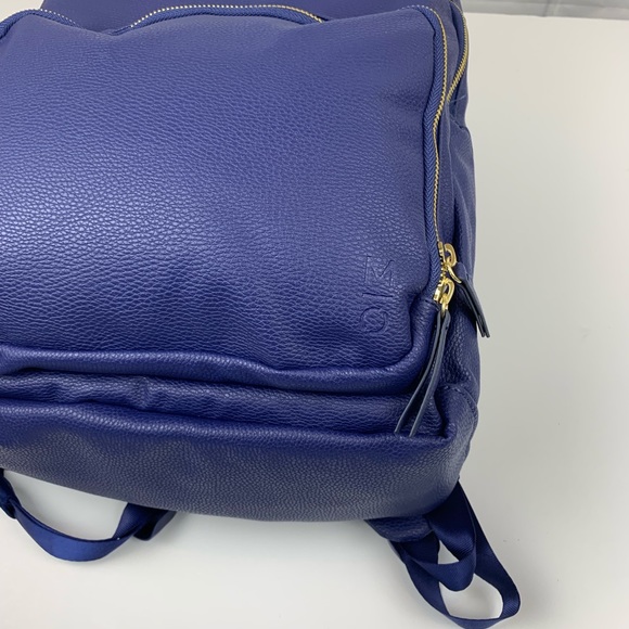 motile vegan leather backpack